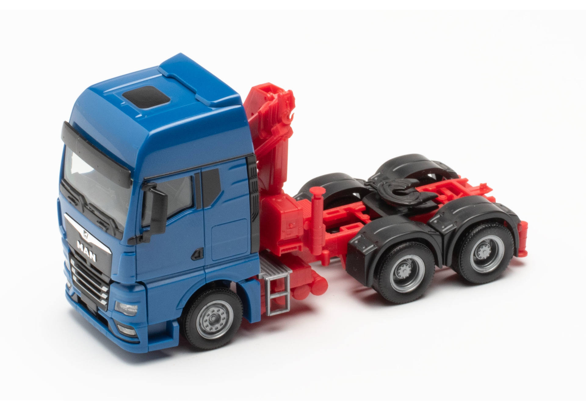 Herpa 313100-002 | MAN TGX GX 6x4 Zugmaschine mit Ladekran, blau | 1:87