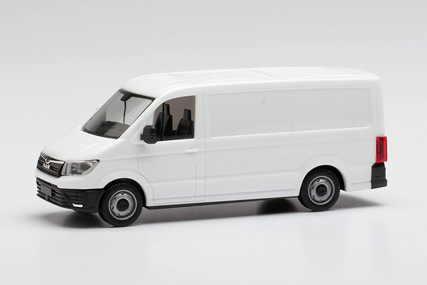 Herpa Minikit 013857 - MAN TGE Kasten Flachdach, weiß. 1:87