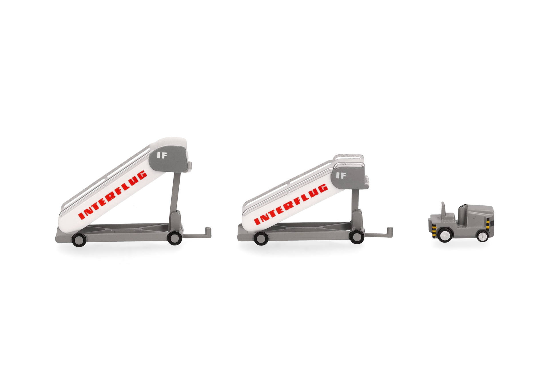 Herpa Wings Zubehör 573153 | Interflug | Fluggasttreppen (2x) mit Zugfahrzeug (1x) | 1:200