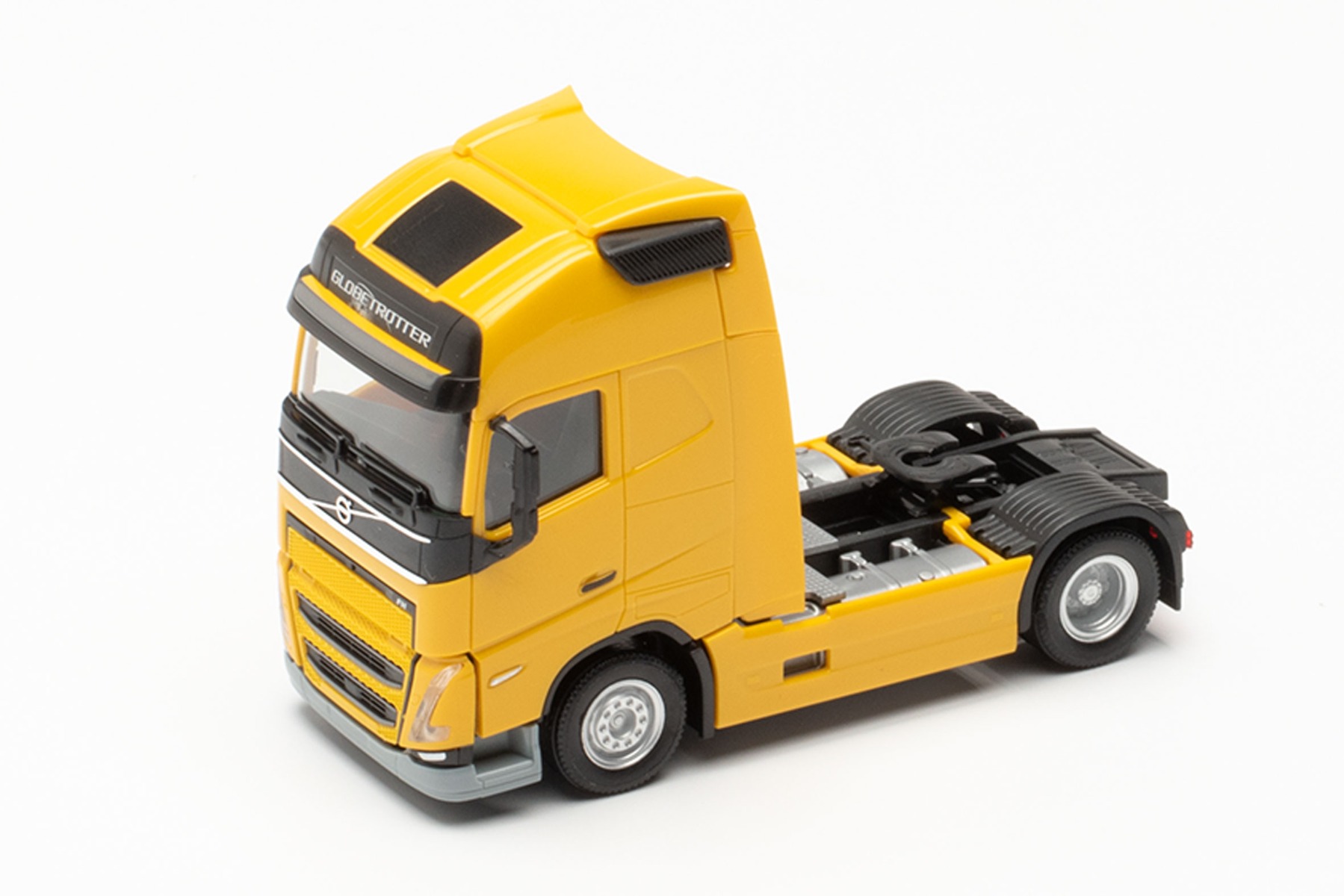 Herpa 313377-002 - Volvo FH Gl. XL 2020 - Zugmaschine Erweiterte Ausstattung, maisgelb. 1:87
