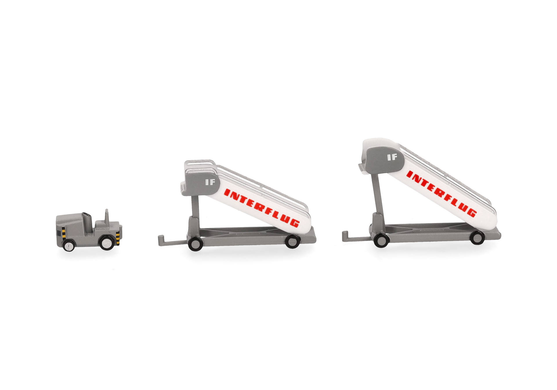 Herpa Wings Zubehör 573153 | Interflug | Fluggasttreppen (2x) mit Zugfahrzeug (1x) | 1:200