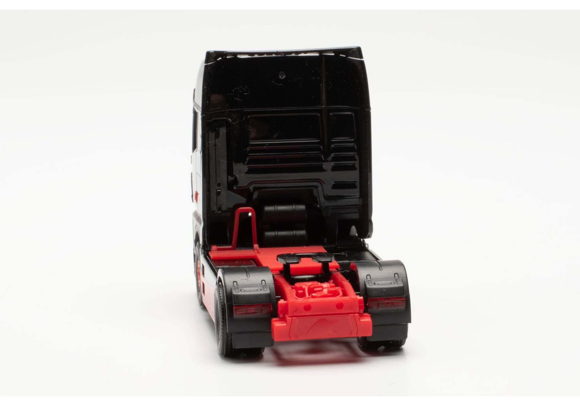 Herpa 317092 | MAN eTGX Zugmaschine | schwarz/rot | 1:87