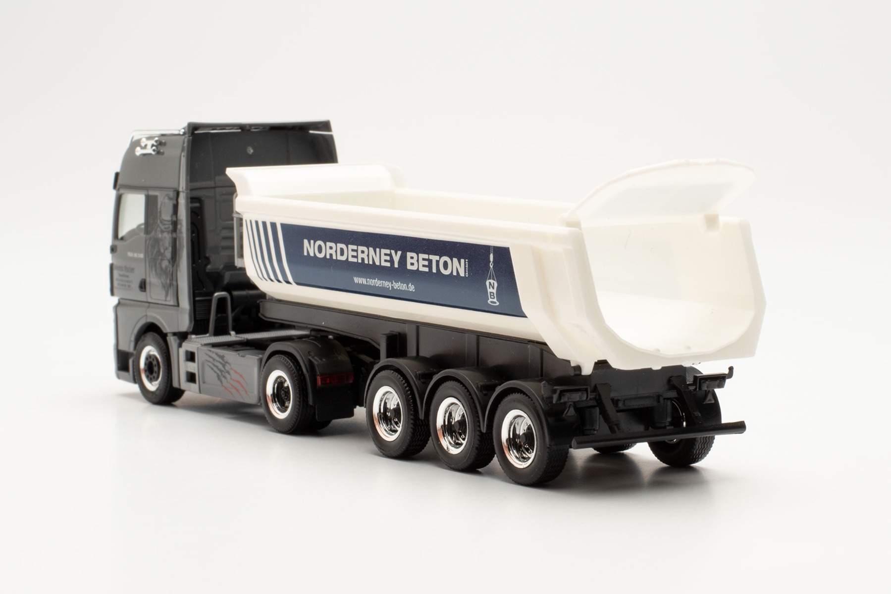 Herpa 950671 - MAN TGX GX Individual Rundmulden-Sattelzug "Norderney Beton/Janssen & Fischer". 1:87