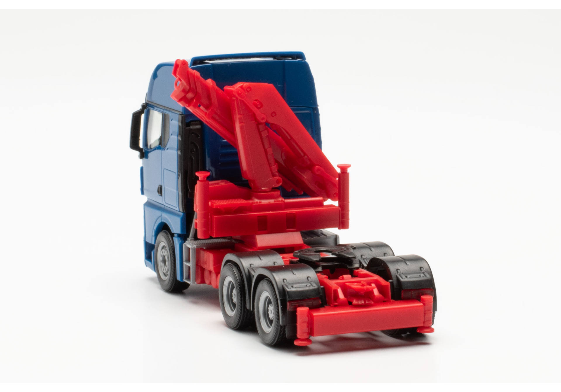 Herpa 313100-002 | MAN TGX GX 6x4 Zugmaschine mit Ladekran, blau | 1:87