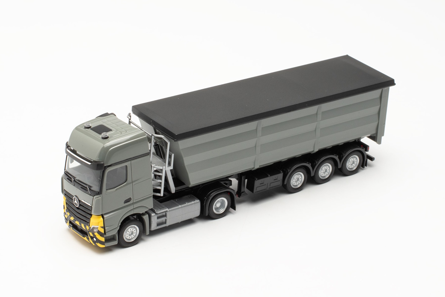 Herpa 316545 | Mercedes-Benz Actros L | Stahlrundmulden-Sattelzug | grau/gelb | 1:87