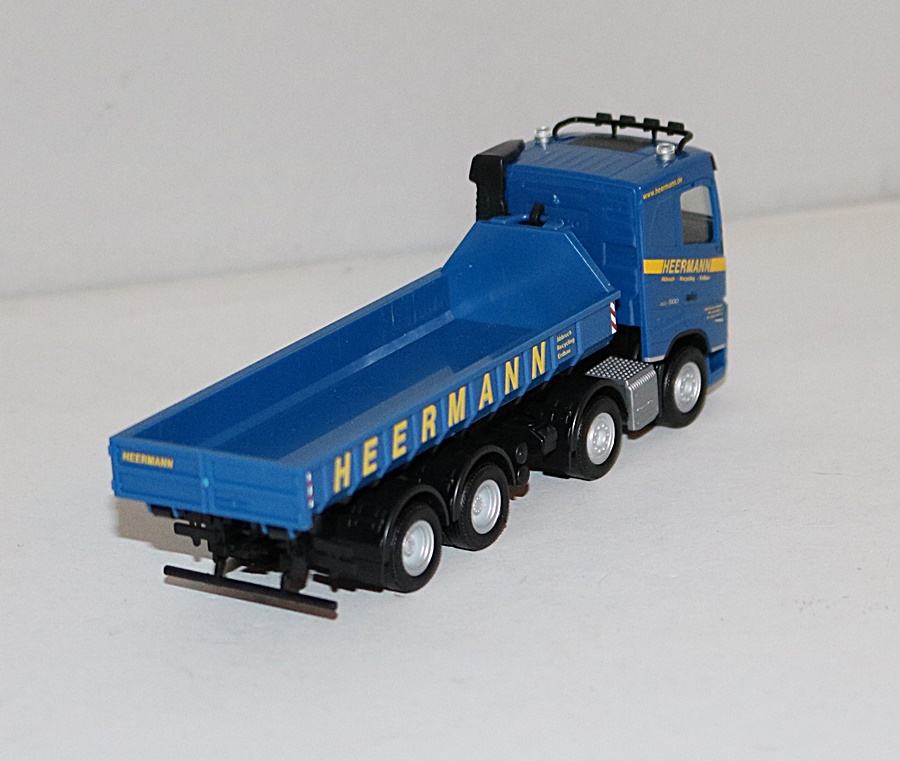 Herpa 953573 |  Volvo FH 2020 FD | Abrollmulden-LKW mit Goldhofer TU4-Anhänger | Heermann | 1:87