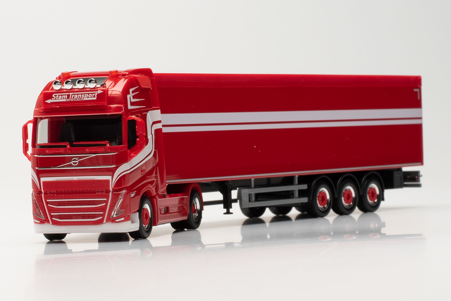 Herpa 314275 - Volvo FH Gl. XL 2020 Schubboden-Sattelzug - Stam Transport (NL/Waalwijk). 1:87