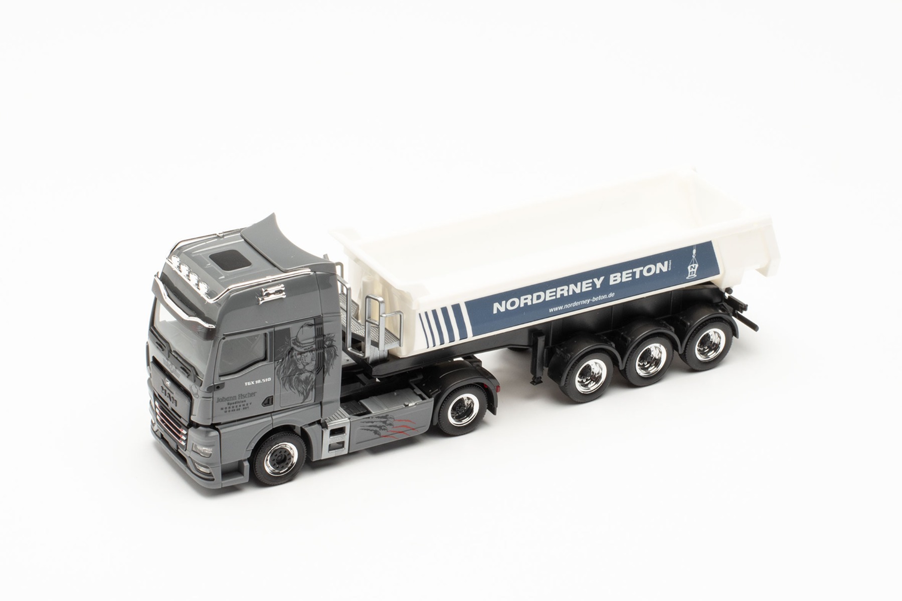 Herpa 950671 - MAN TGX GX Individual Rundmulden-Sattelzug "Norderney Beton/Janssen & Fischer". 1:87