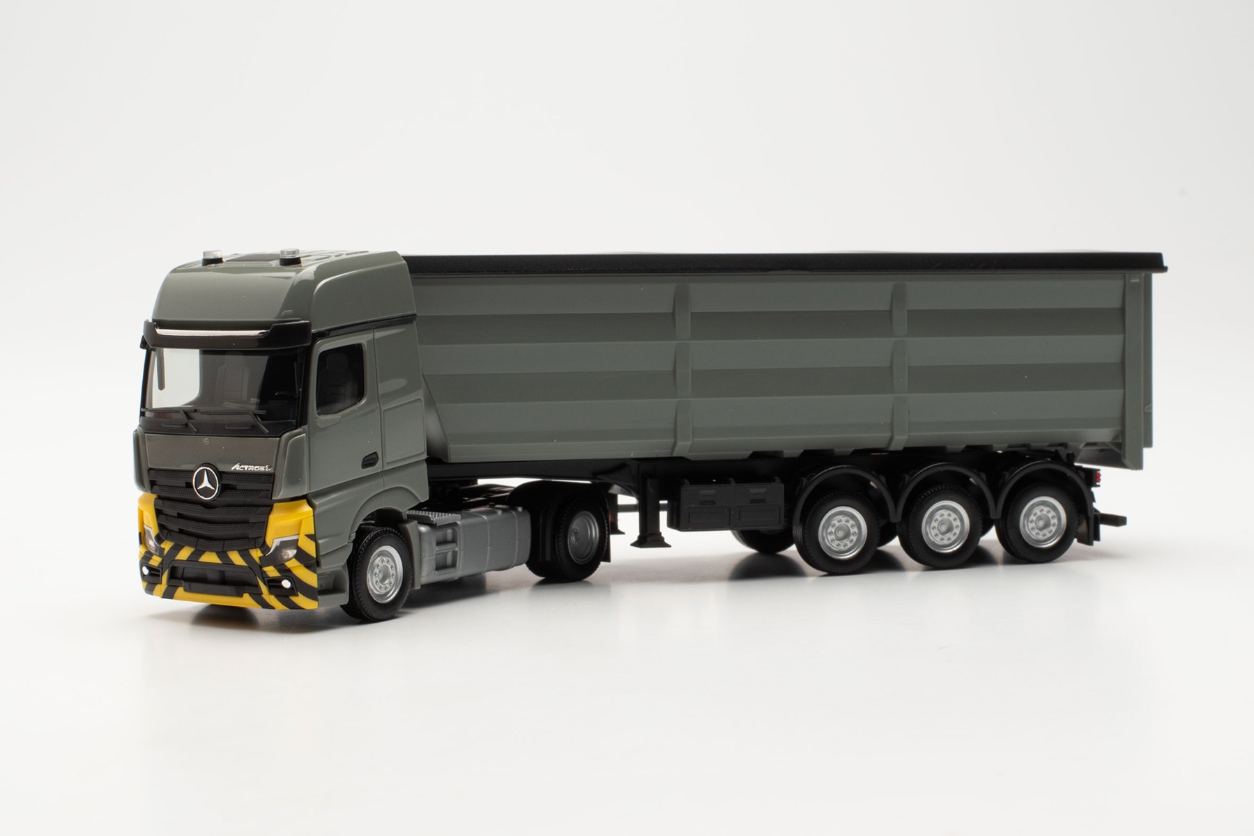 Herpa 316545 | Mercedes-Benz Actros L | Stahlrundmulden-Sattelzug | grau/gelb | 1:87